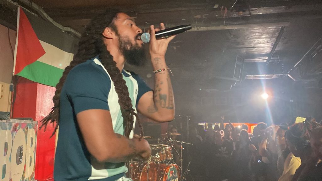 Bob Vylan Singer Asks UK Crowd to Stop “Death to the IDF” Chant Amid Police Investigation